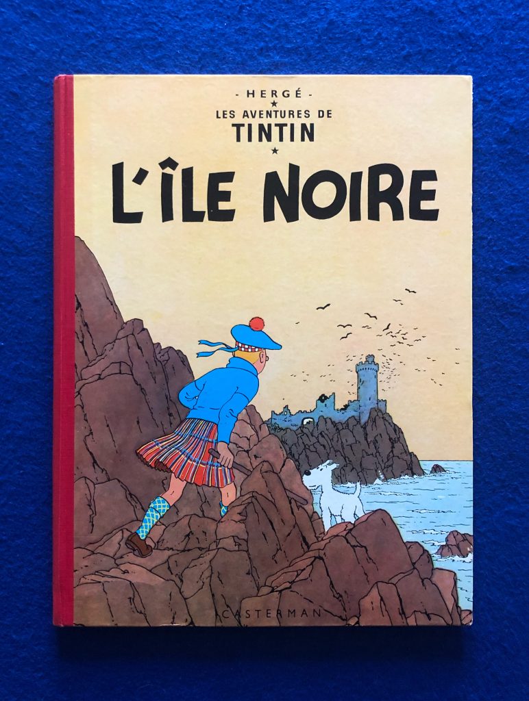 Réédition de L'Ile Noire de 1958, 4ème plat B26, dos Rouge, Pages de garde bleu claire, Imprimé en Belgique.
