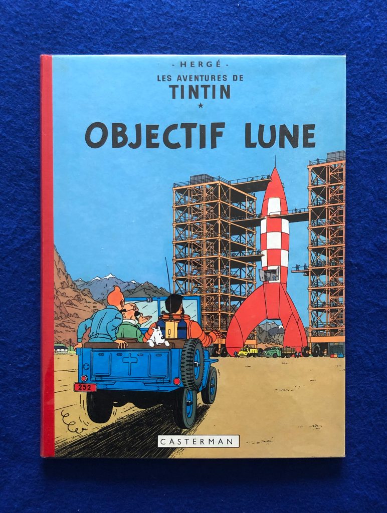 Réédition de Objectif Lune 1964, 4ème plat B35, dos Rouge, Pages de garde bleu clair, Imprimé en Belgique. Proche du neuf.